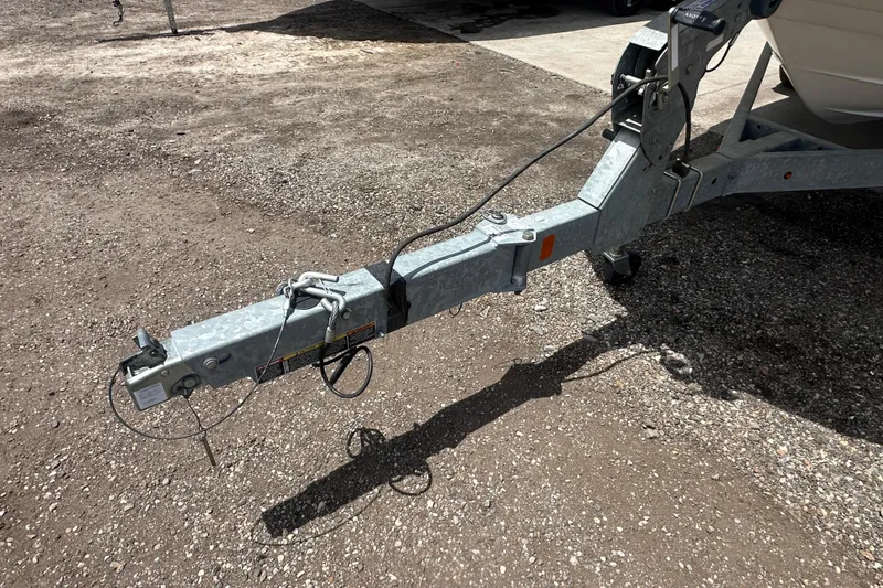 Slide: The Image of Trailer hitch of a 2017 Sea Ray SPX 190 Outboard on gravel surface. - 39