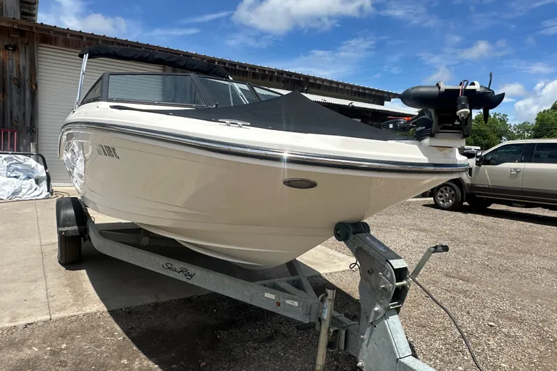 Slide: The Image of 2017 Sea Ray SPX 190 Outboard boat on trailer under blue sky. - 5