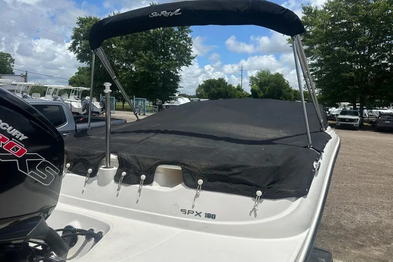 Slide: The Image of 2017 Sea Ray SPX 190 Outboard boat with cover and Mercury Pro XS engine. - 9