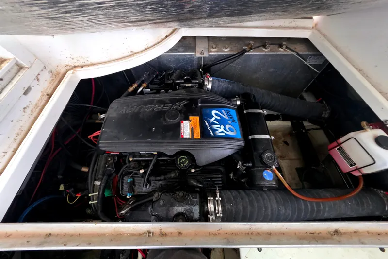 Slide: The Image of Engine compartment of a 2001 Carver 350 Mariner with a Mercury 6.2 MPI engine. - 40