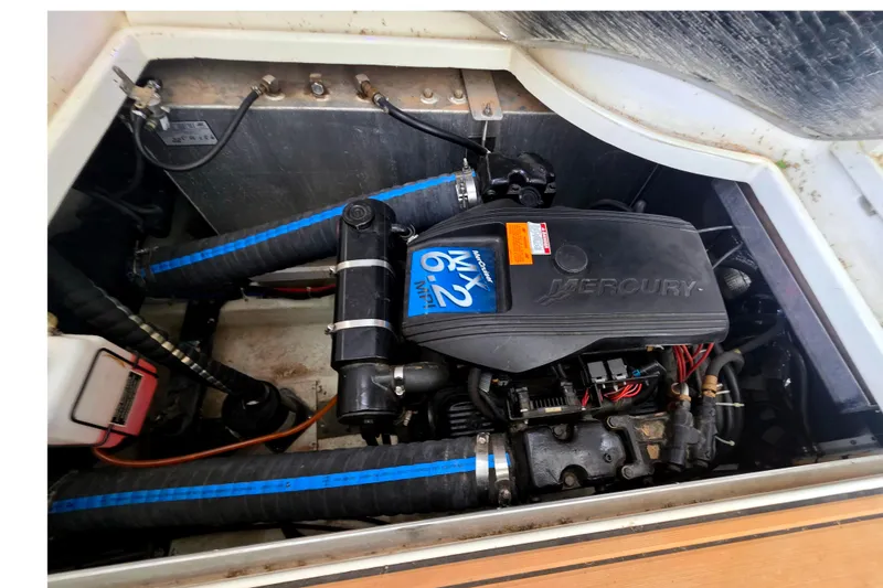 Slide: The Image of Engine compartment of a 2001 Carver 350 Mariner with Mercury MX 6.2 MPI engine. - 43