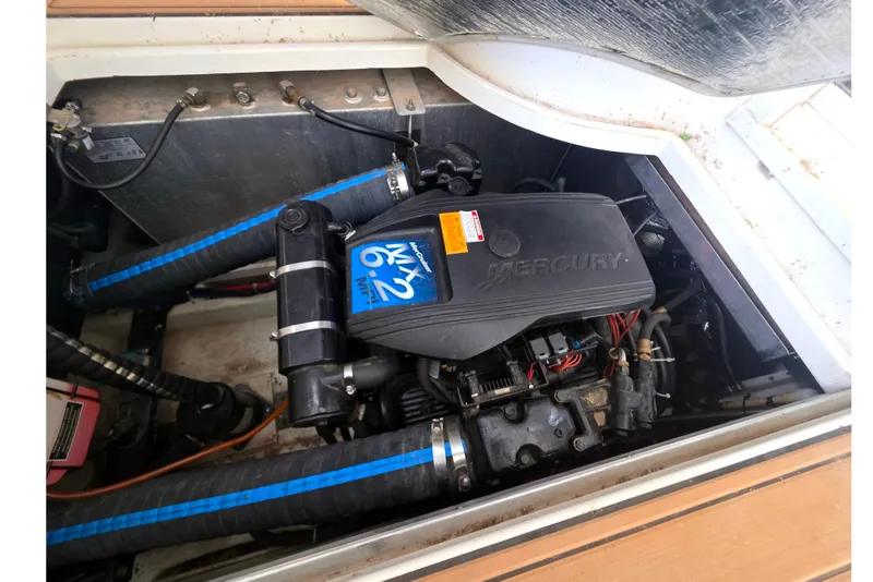 Slide: The Image of Engine compartment of a 2001 Carver 350 Mariner with Mercury MX 6.2 MPI engine. - 44