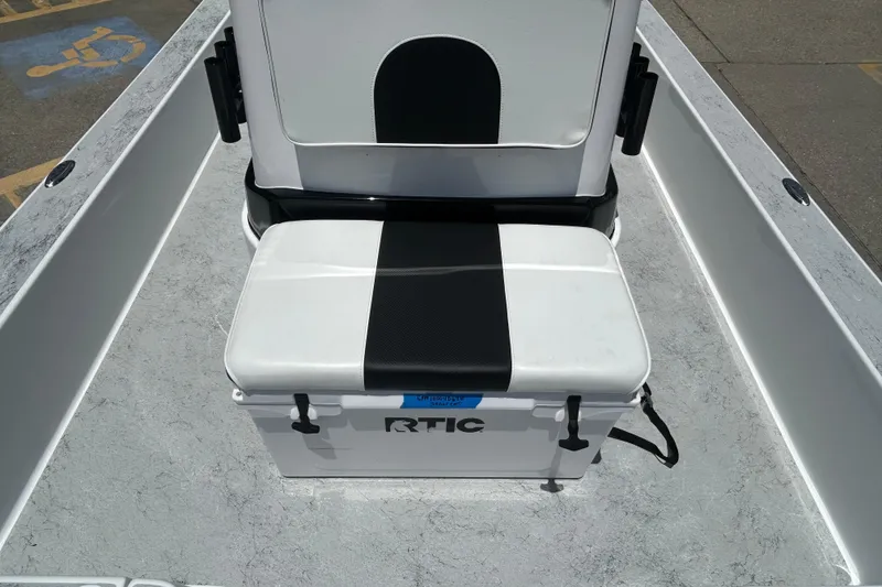 Slide: The Image of 2026 Gulf Coast Saber Cat 25 boat interior with RTIC cooler seat. - 27