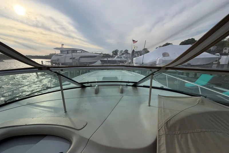 Slide: The Image of View from a 2000 Sea Ray Sundancer 460 yacht, docked with scenic waterfront. - 22