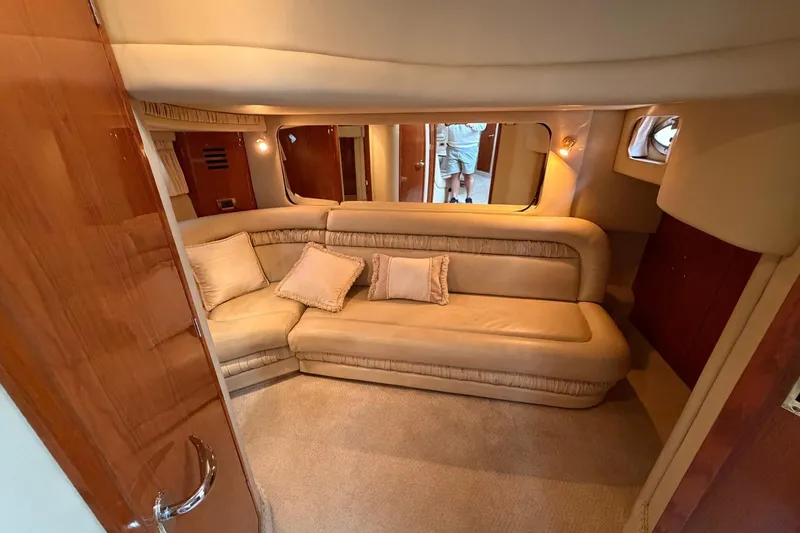 Slide: The Image of Luxurious interior of 2000 Sea Ray Sundancer 460 yacht with plush seating and elegant decor. - 29