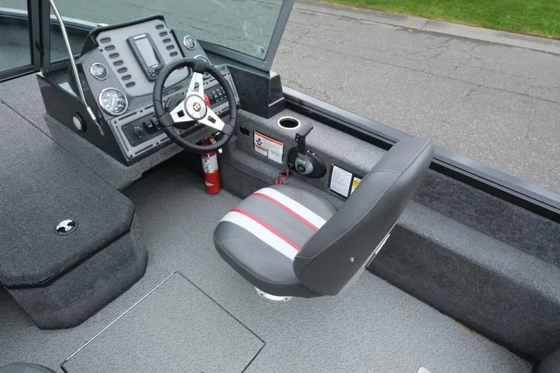 Slide: The Image of 2018 Ranger VS1670 WT boat interior with steering wheel and seat. - 10