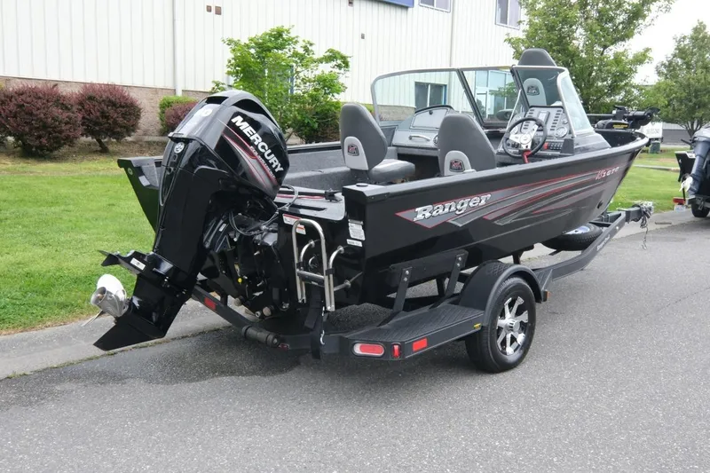 Slide: The Image of 2018 Ranger VS1670 WT boat with Mercury engine on trailer, parked outdoors. - 3