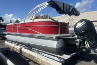 Slide: The Image of 2023 Cypress Cay Seabreeze 232 pontoon boat with Mercury engine on trailer. - 5