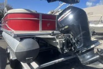 Slide: The Image of 2023 Cypress Cay Seabreeze 232 pontoon boat with Mercury outboard motor. - 6