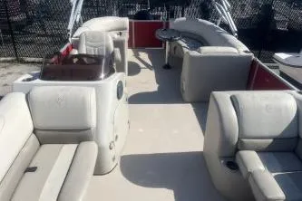 Slide: The Image of 2023 Cypress Cay Seabreeze 232 pontoon boat with spacious seating and modern design. - 8