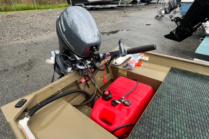Slide: The Image of 2025 G3 Gator Tough 1436 boat with Yamaha outboard motor and red fuel tank. - 6