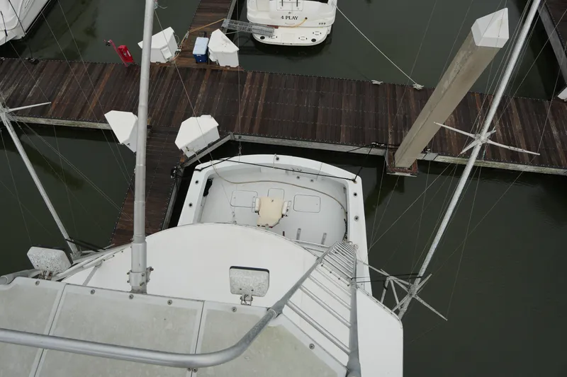 Slide: The Image of Aerial view of 1980 Hatteras 50 Convertible yacht docked at marina. - 30