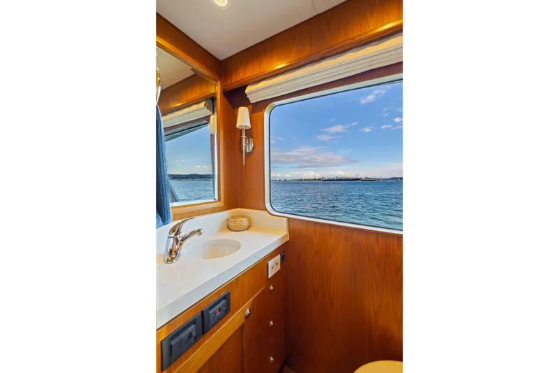 Slide: The Image of Luxurious bathroom interior of 2023 Offshore Yachts 64 ELV with ocean view. - 18