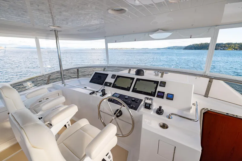 Slide: The Image of Luxurious helm of 2023 Offshore Yachts 64 ELV with panoramic ocean view. - 37
