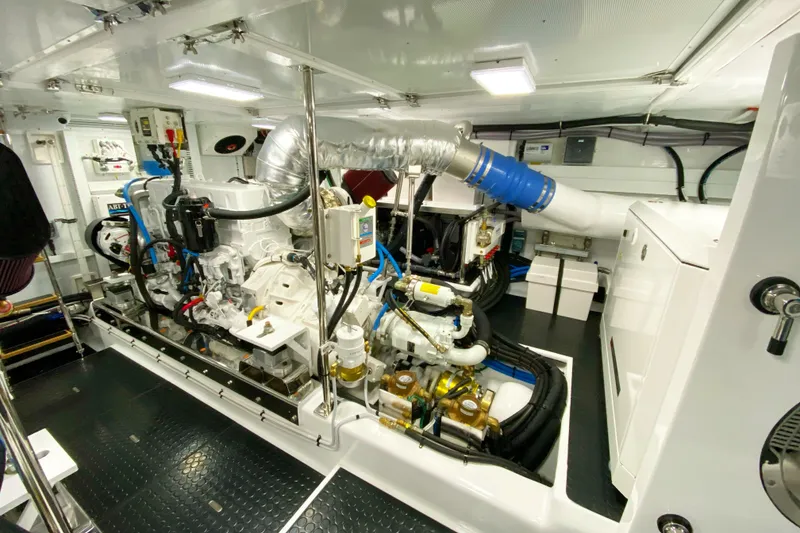 Slide: The Image of Engine room of 2023 Offshore Yachts 64 ELV, showcasing advanced marine machinery. - 48