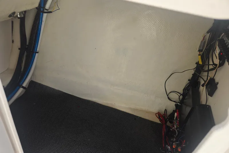 Slide: The Image of Interior wiring and components of a 2018 Chaparral 267 SSX boat. - 16
