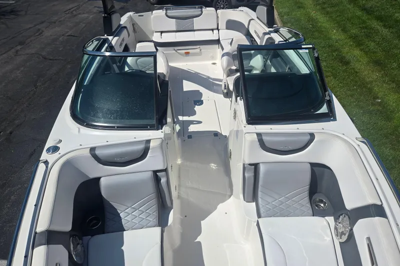 Slide: The Image of 2018 Chaparral 267 SSX boat interior with sleek seating and modern design. - 20
