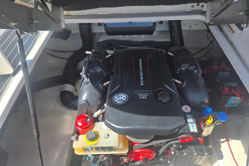 Slide: The Image of Engine compartment of 2018 Chaparral 267 SSX with Volvo Penta 350 V8 engine. - 24