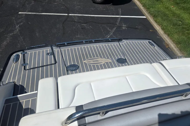 Slide: The Image of 2018 Chaparral 267 SSX boat deck with sleek design and comfortable seating. - 26