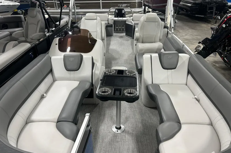 Slide: The Image of 2022 Tahoe Pontoon Cascade Quad Lounger with luxurious seating and modern design. - 2