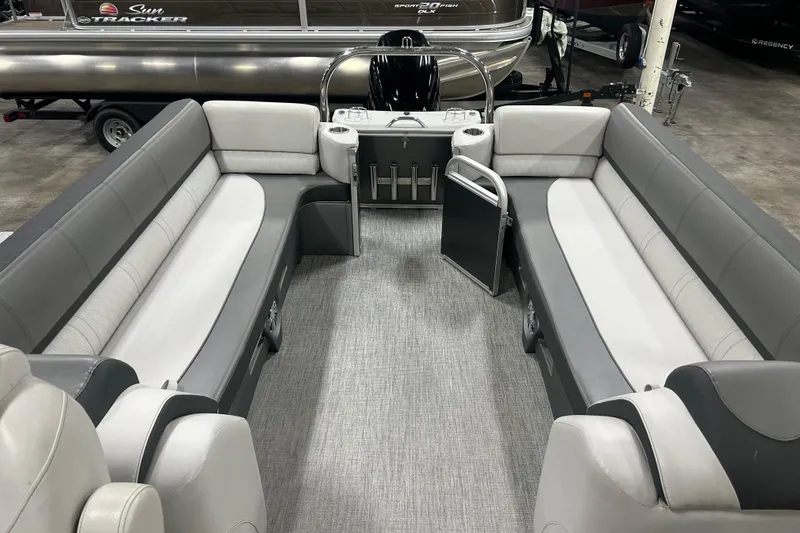 Slide: The Image of 2022 Tahoe Pontoon Cascade Quad Lounger interior with gray seating and modern design. - 7