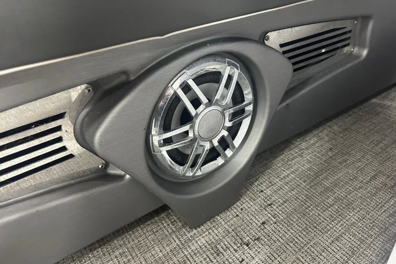 Slide: The Image of Speaker detail on 2022 Tahoe Pontoon Cascade Quad Lounger boat interior. - 8