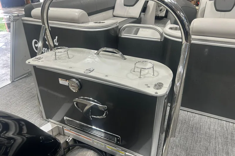 Slide: The Image of 2022 Tahoe Pontoon Cascade Quad Lounger interior with seating and storage features. - 9