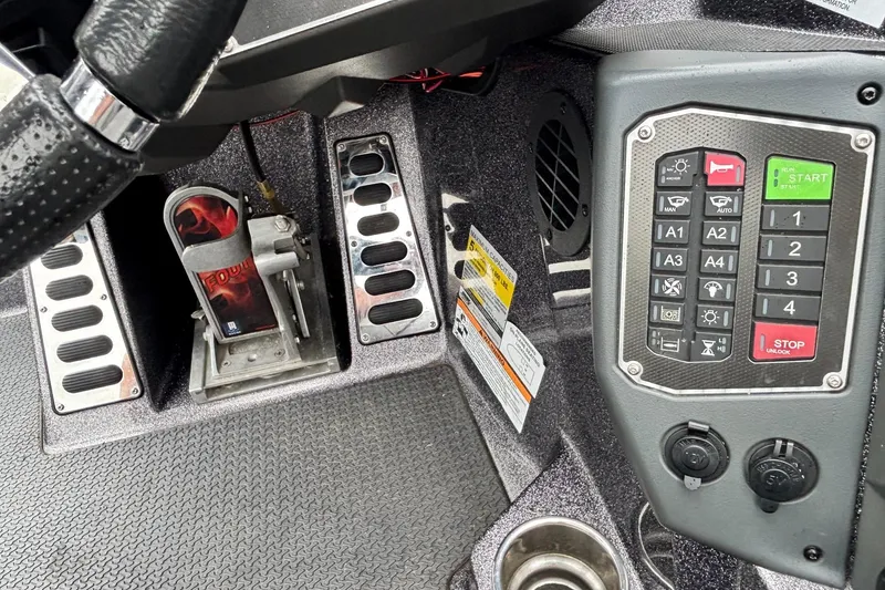 Slide: The Image of 2019 Ranger Z521L boat dashboard with control panel and foot pedal. - 11