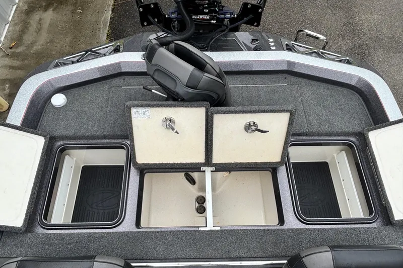Slide: The Image of 2019 Ranger Z521L boat deck with storage compartments and seating. - 14
