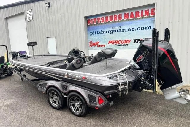 Slide: The Image of 2019 Ranger Z521L bass boat at Pittsburg Marine dealership, featuring dual-axle trailer and Mercury engine. - 17