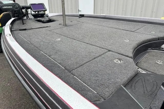 Slide: The Image of 2019 Ranger Z521L boat deck with Lowrance electronics, featuring spacious storage compartments. - 6