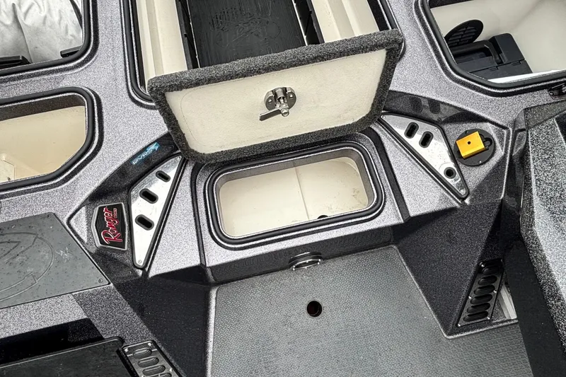 Slide: The Image of 2019 Ranger Z521L boat storage compartments and control panel. - 8