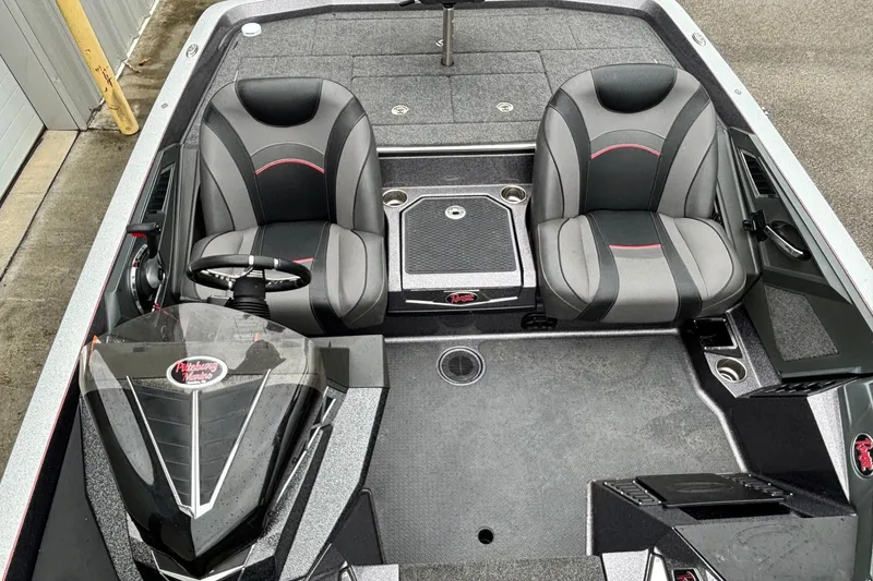 Slide: The Image of 2019 Ranger Z521L boat interior with dual seats and steering console. - 9