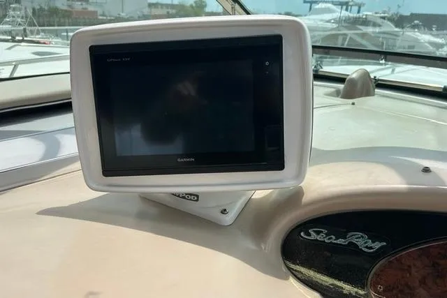Slide: The Image of Garmin GPS on 2001 Sea Ray 38 Sundancer yacht dashboard. - 6