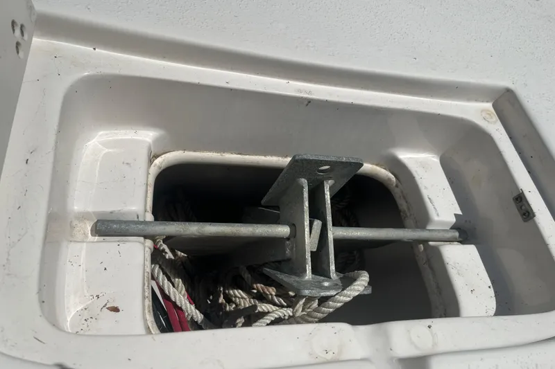 Slide: The Image of Anchor storage compartment on a 2021 Sea Chaser 21 LX boat. - 18