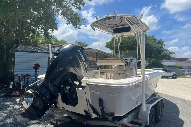 Slide: The Image of 2021 Sea Chaser 21 LX boat with Mercury outboard motor on trailer. - 3