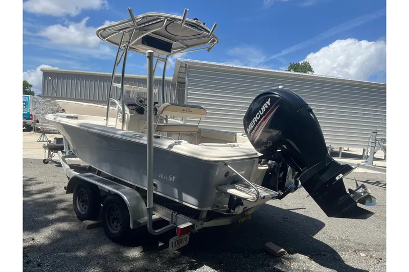 Slide: The Image of 2021 Sea Chaser 21 LX boat with Mercury outboard motor on trailer. - 5