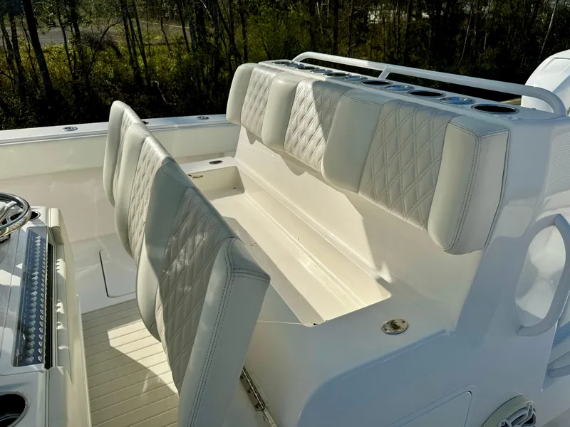 Slide: The Image of Luxury seating on 2020 Invincible 37 Catamaran with diamond-stitched upholstery. - 23