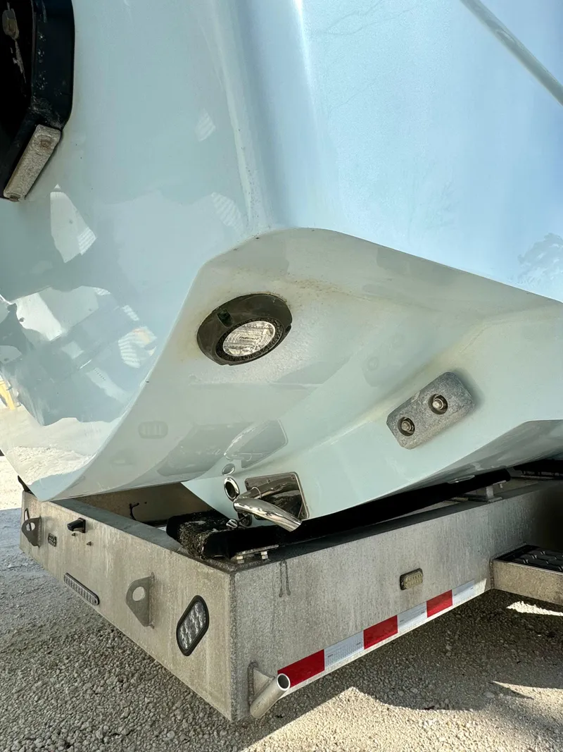 Slide: The Image of 2020 Invincible 37 Catamaran on trailer, showcasing hull and fittings. - 7