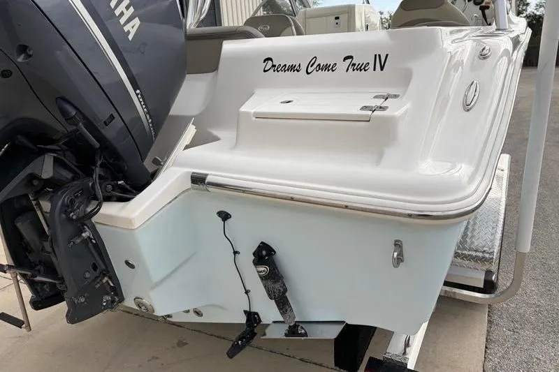 Slide: The Image of 2024 Key West 239 DFS boat with Yamaha engine, named "Dreams Come True IV." - 13