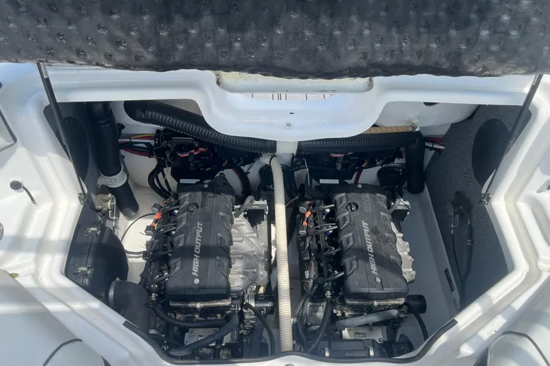Slide: The Image of 2014 Yamaha Boats AR240 HO engine compartment with dual high-output engines. - 10