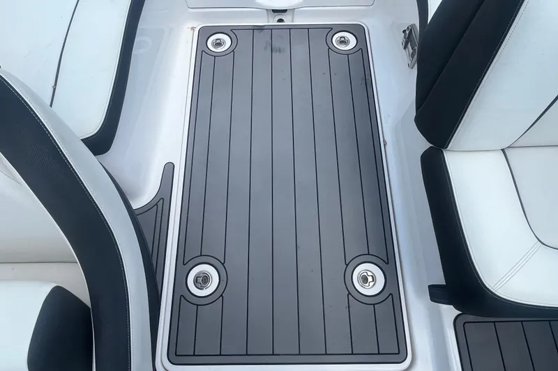 Slide: The Image of 2014 Yamaha Boats AR240 HO interior with sleek seating and deck design. - 17
