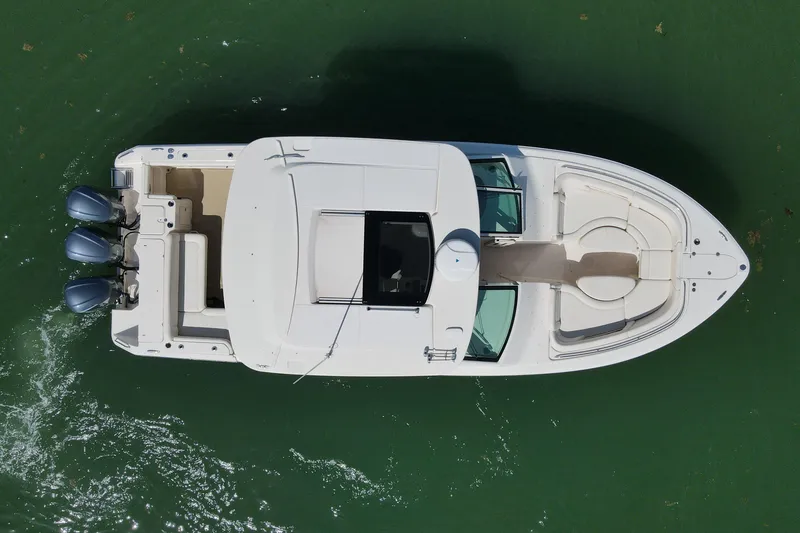 Slide: The Image of Overhead view of 2019 Grady-White Freedom 375 boat on green water. - 26