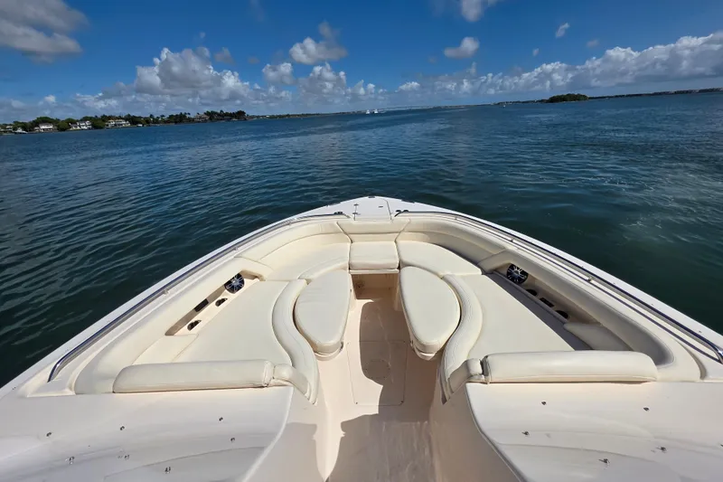 Slide: The Image of 2019 Grady-White Freedom 375 boat with spacious seating on calm waters. - 21
