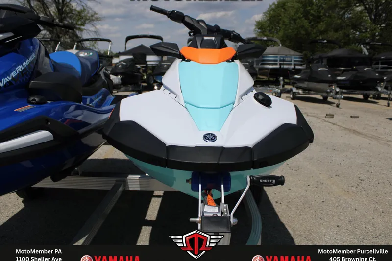 Slide: The Image of 2026 Yamaha WaveRunner JetBlaster LTD in vibrant colors, displayed outdoors on a trailer. - 2