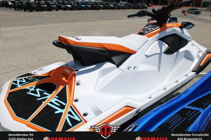 Slide: The Image of 2026 Yamaha WaveRunner JetBlaster LTD in white and orange, displayed outdoors. - 4