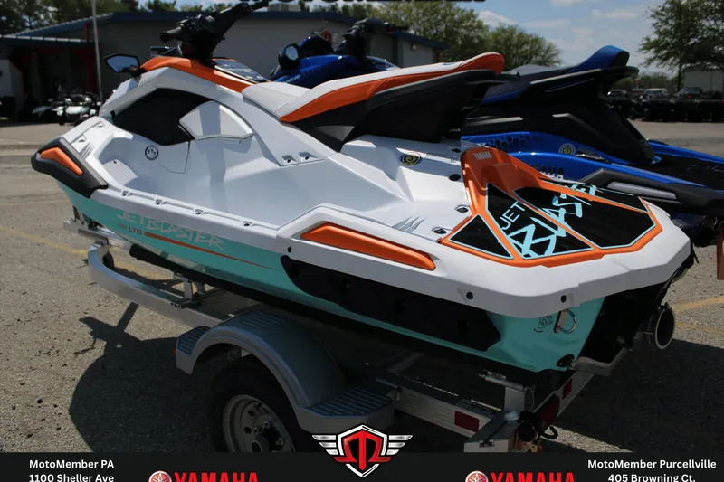 Slide: The Image of 2026 Yamaha WaveRunner JetBlaster LTD on trailer, vibrant design, parked outdoors. - 7