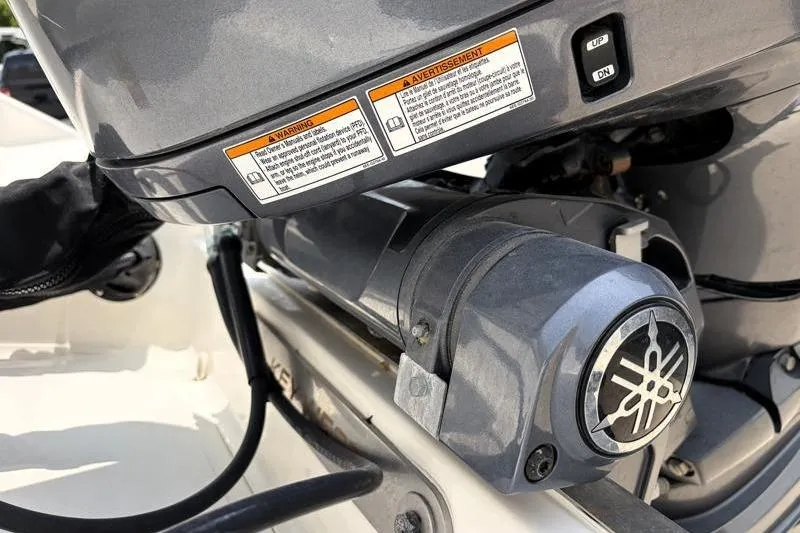 Slide: The Image of Close-up of a 2024 Key West 203 FS boat engine with Yamaha branding. - 17
