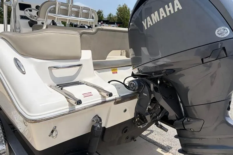 Slide: The Image of 2024 Key West 203 FS boat with Yamaha outboard motor, rear view. - 14