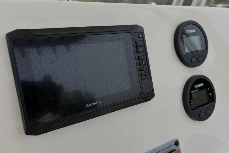 Slide: The Image of Dashboard of 2024 Key West 203 FS boat with Garmin and Yamaha displays. - 31